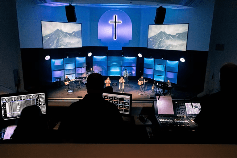 House of Worship behind Audio Visual Systems mixing boards and screens 3